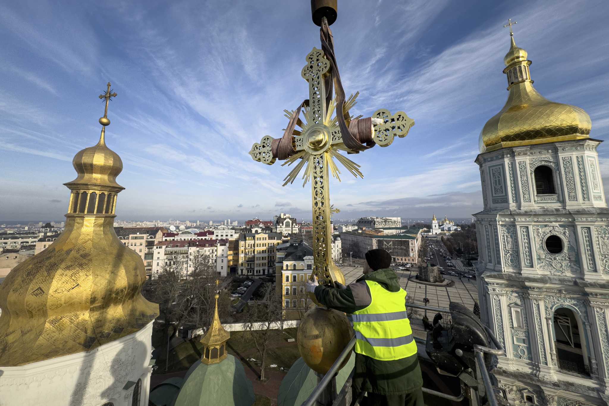 Authorities return restored golden crosses to the domes of Kyiv's St Sophia Cathedral - San Francisco Chronicle